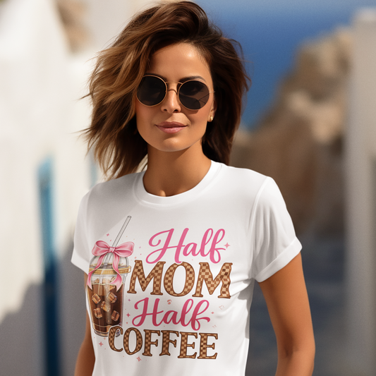 Woman wearing a white t-shirt with 'Half Mom Half Coffee' text and a coffee graphic.